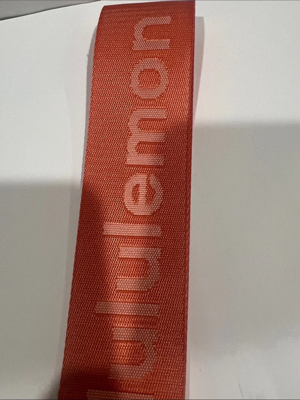 lululemon athletica Coral Orange Wrist Lanyard with Metal Clip
